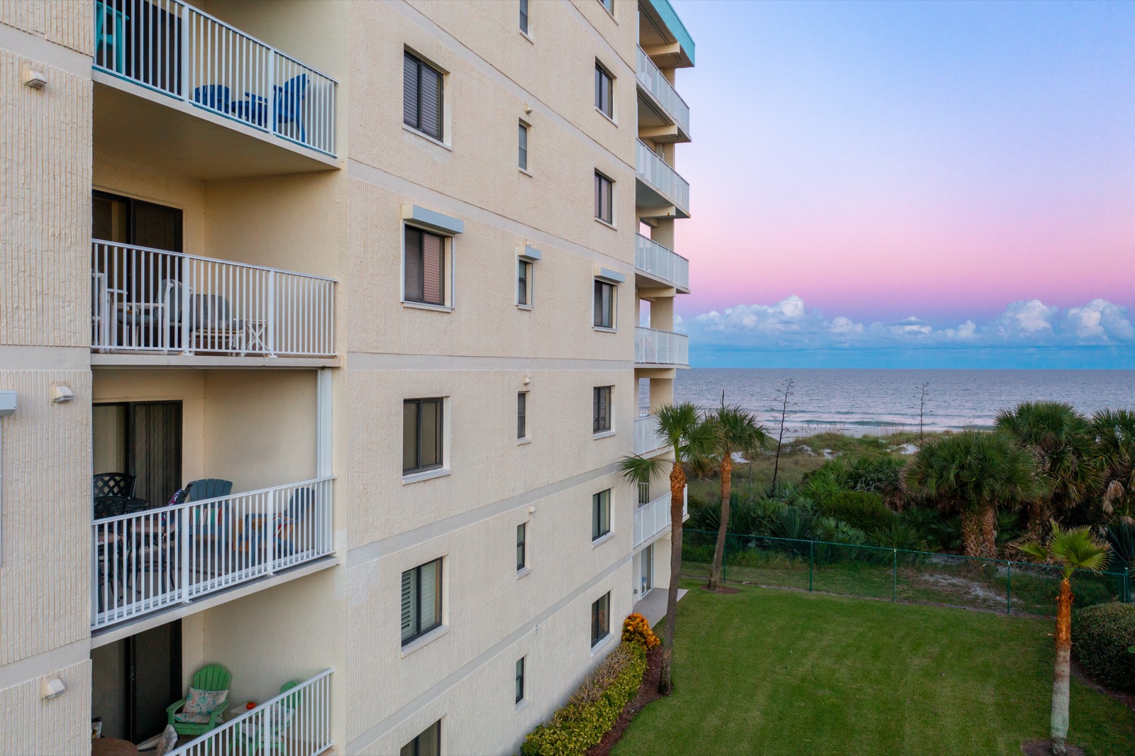 Sandcastles Condominiums on Cocoa Beach at dusk from above